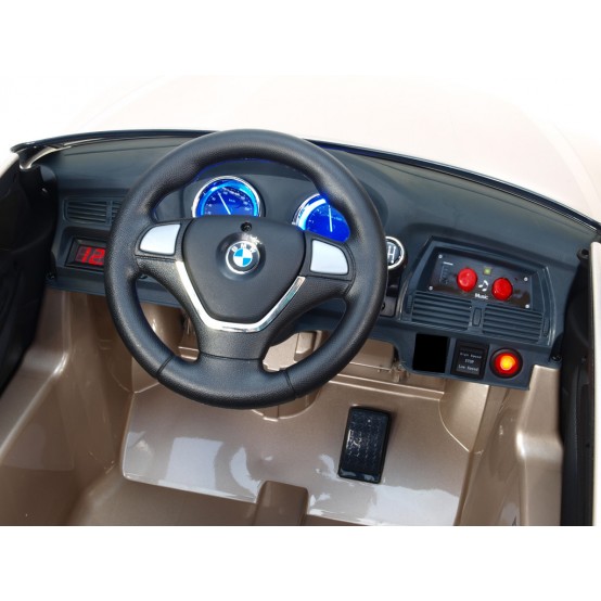 BMW X6 s 2.4G bluetooth dálkovým ovládáním a čalouněnou sedačkou, 12V, LAKOVANÉ CHAMPAGNE, rozbaleno